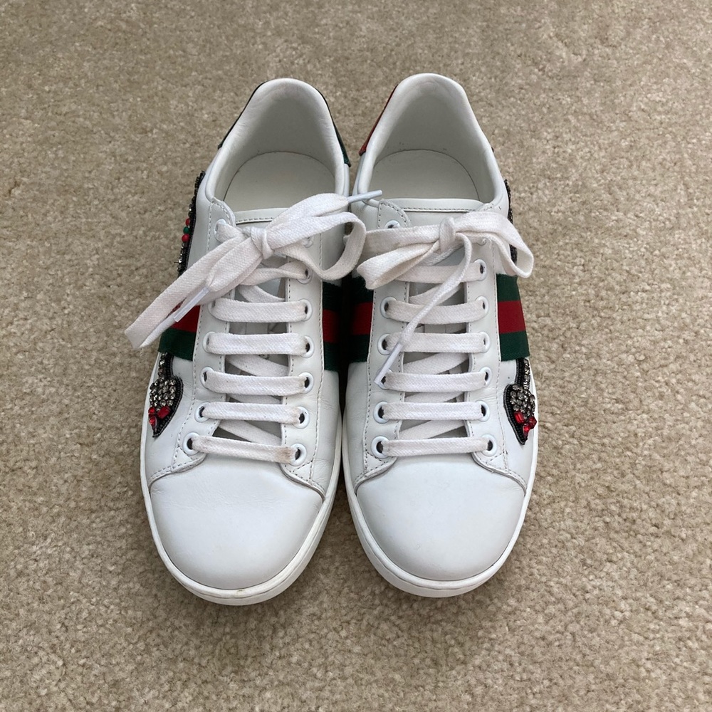 Unique Gucci Ace Embroidered Arrow Sneaker.